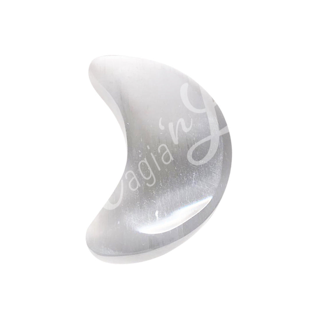 A Polished Selenite crescent moon-shaped bowl viewed from above, showing its curved form.