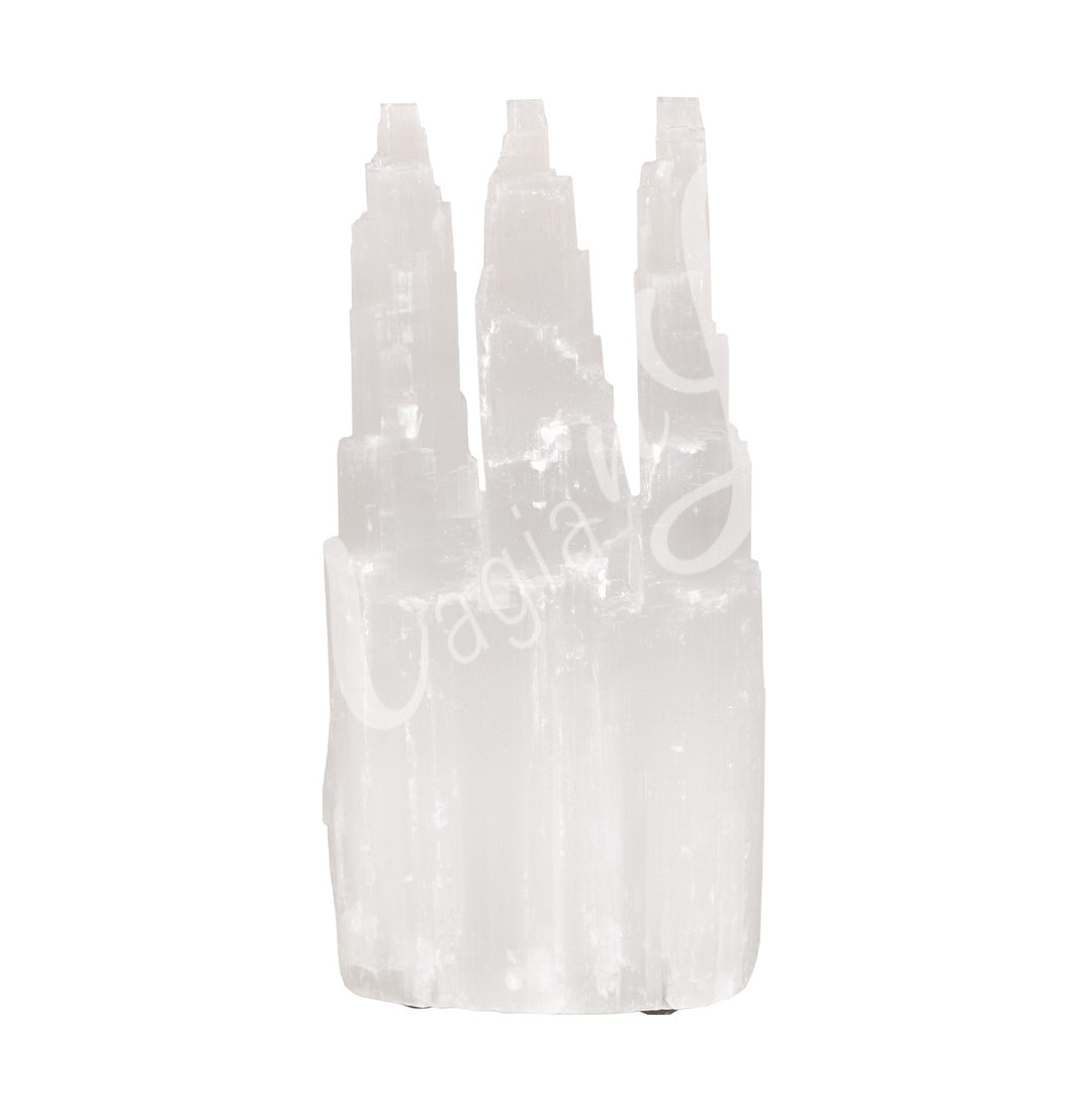 Three selenite iceberg carving with black rubber feet.