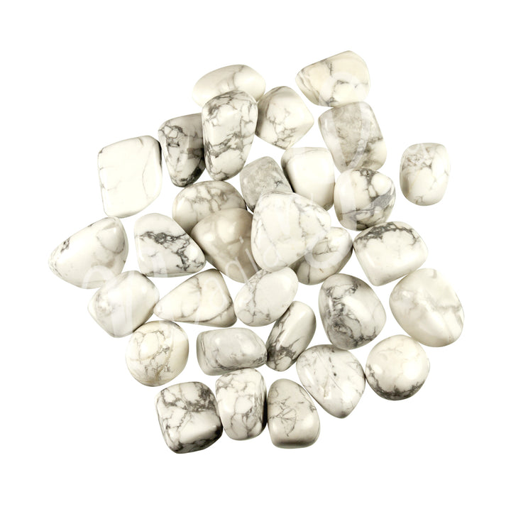 Collection of polished tumbled stones in shades of white and gray, arranged together in a circular pile.