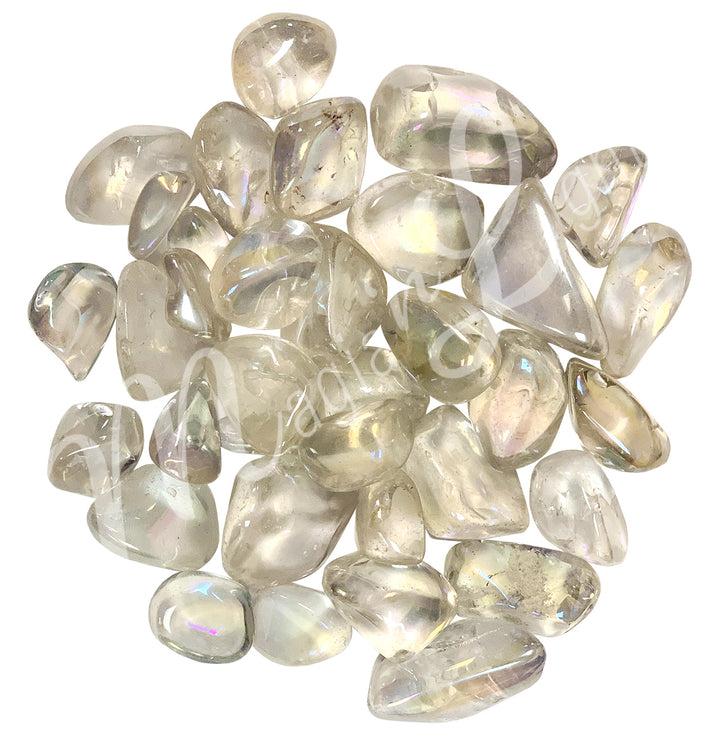 Collection of polished transparent tumbled stones with yellow reflections, arranged together in a circular pile.
