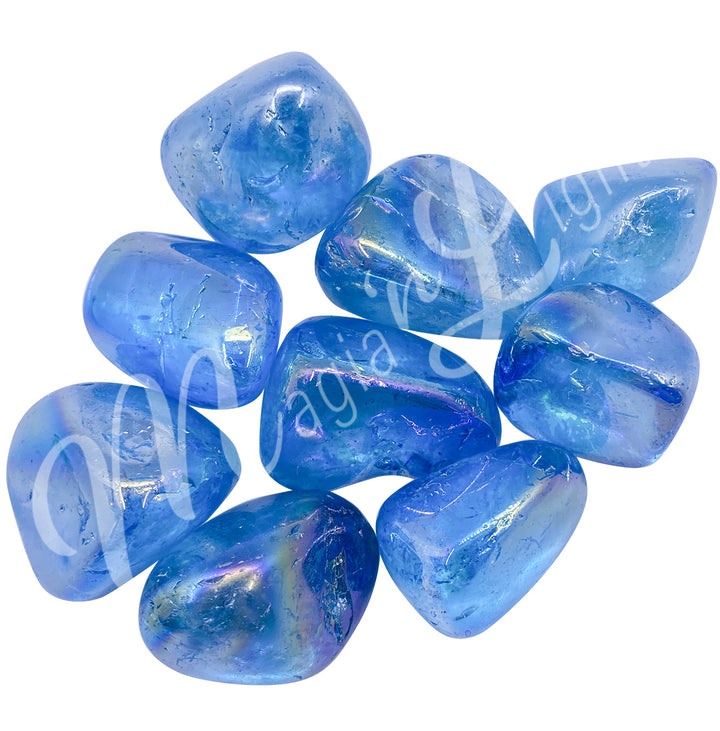 Collection of polished tumbled stones in shades of blue, arranged together in a circular pile.
