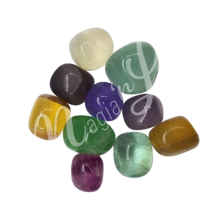 Collection of polished tumbled stones in various shades, arranged together in a circular pile.