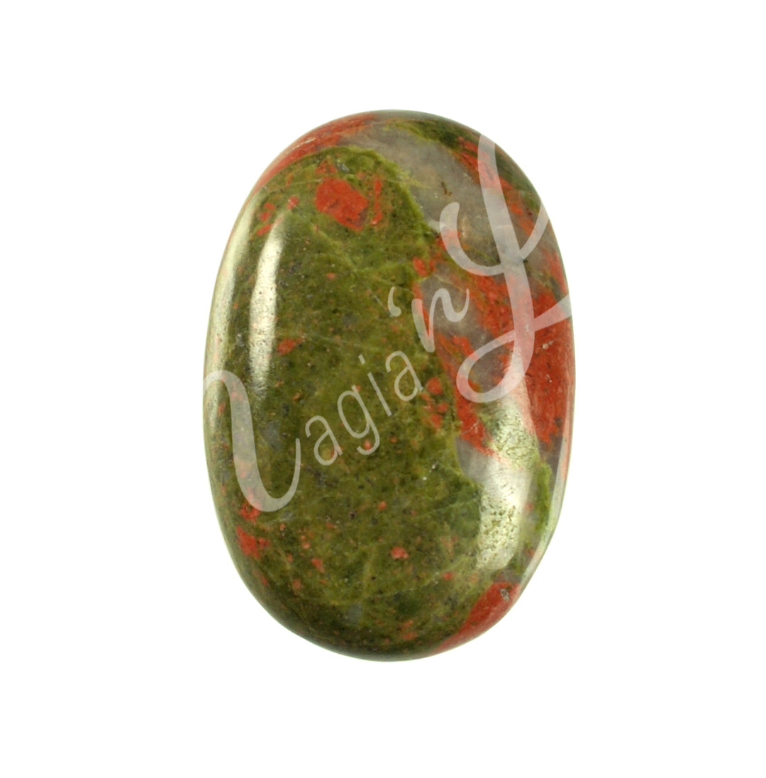 Close-up of a polished oval palm stone made of Unakite.