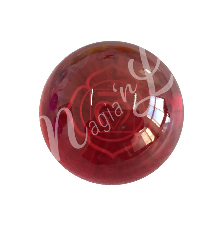 A red sphere featuring the root chakra symbol.
