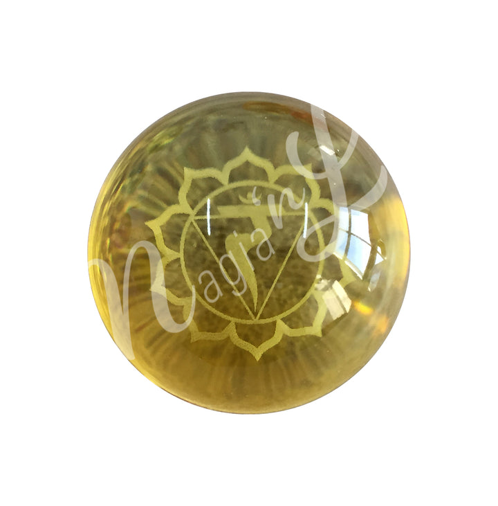 A yellow sphere featuring the solar plexus chakra symbol.