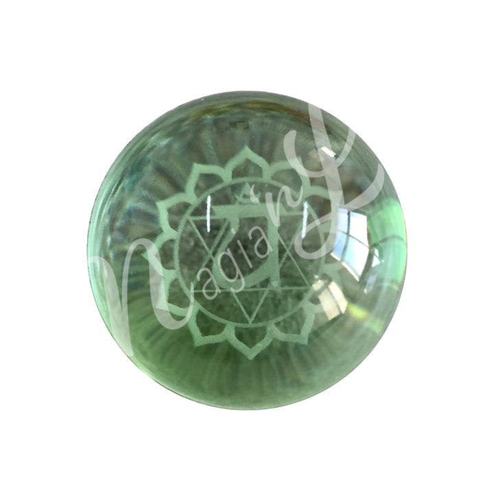 A green sphere featuring the heart chakra symbol.