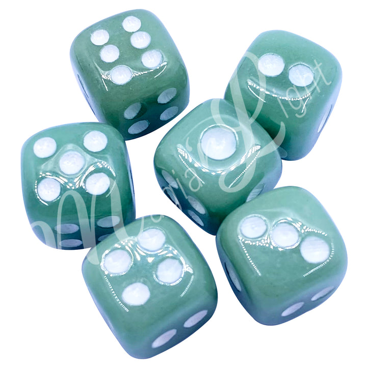 Set of six polished green aventurine gemstone dice with white engraved dots.