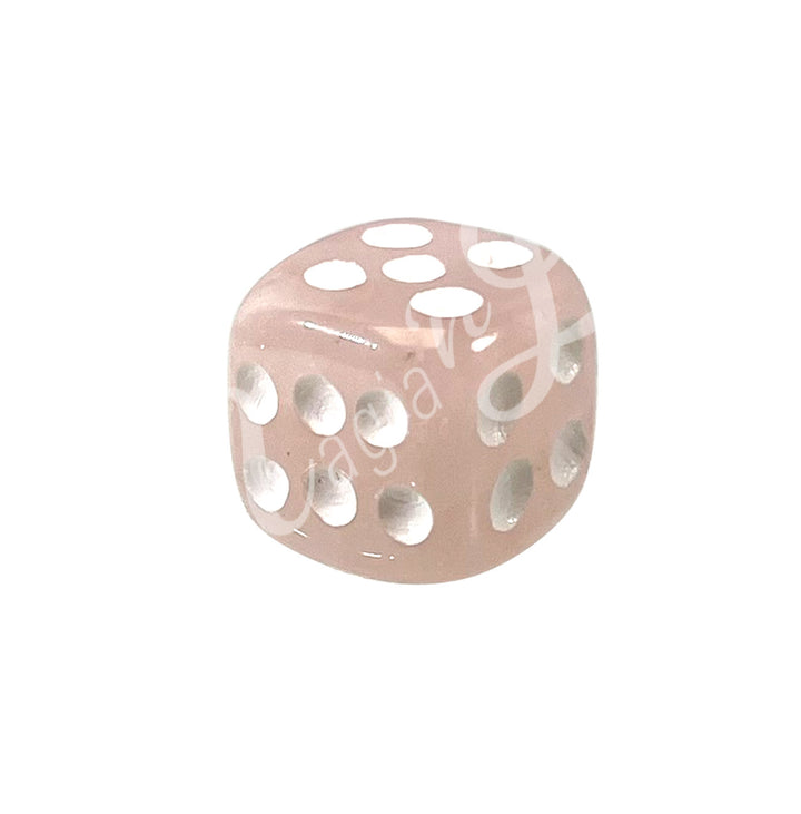 A polished rose quartz gemstone dice with white engraved dots.