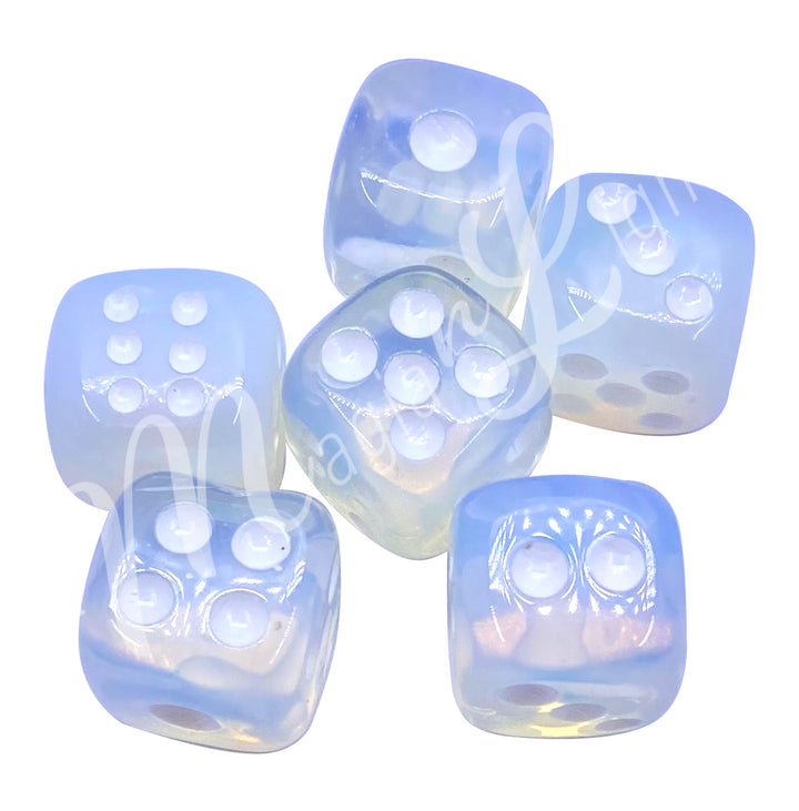 Set of six polished opalite gemstone dice with white engraved dots.