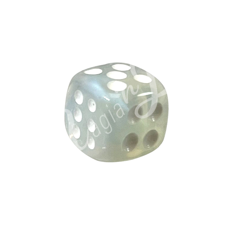 A polished opalite gemstone dice with white engraved dots.
