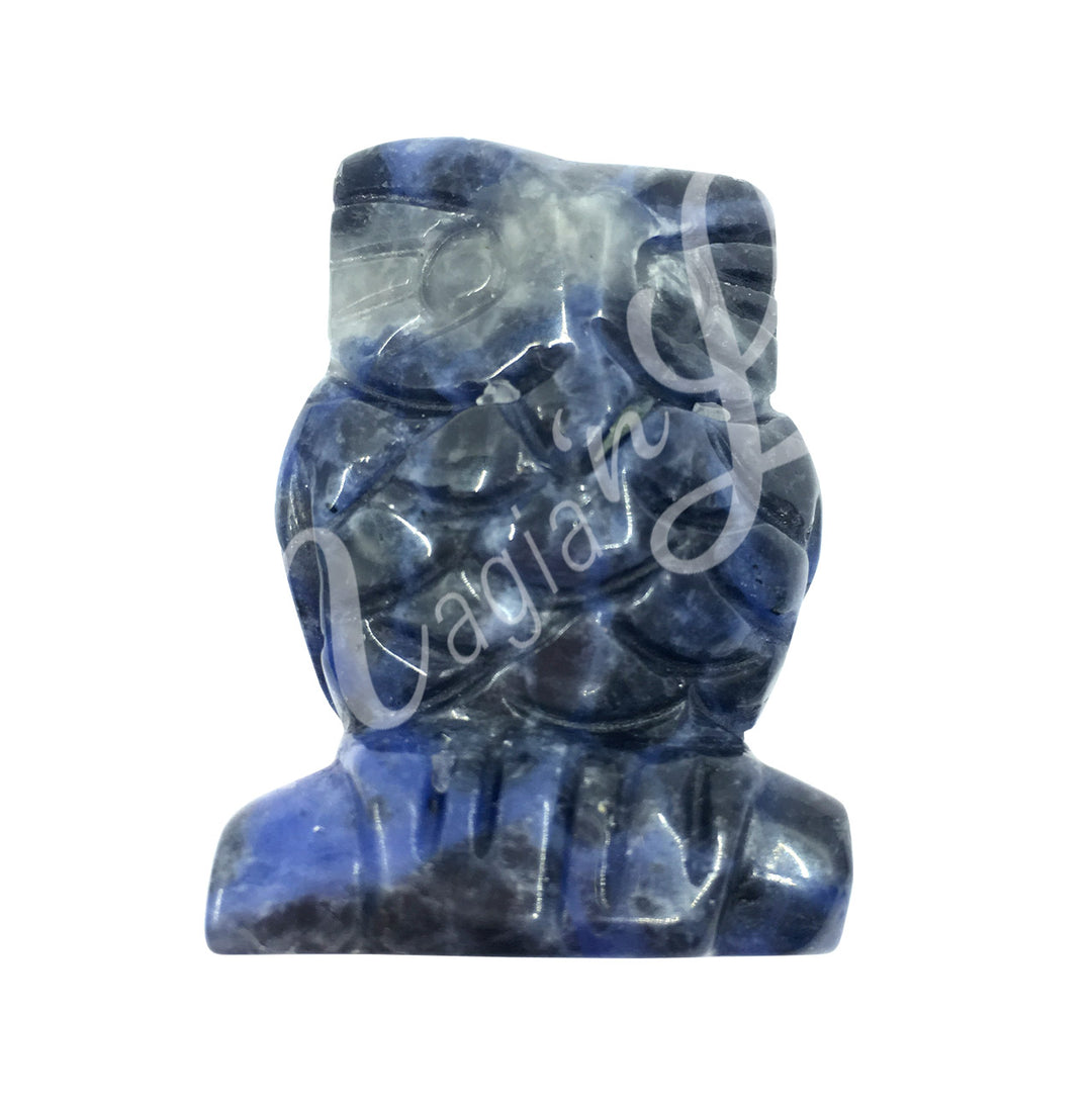 A carving of an owl, made of sodalite.