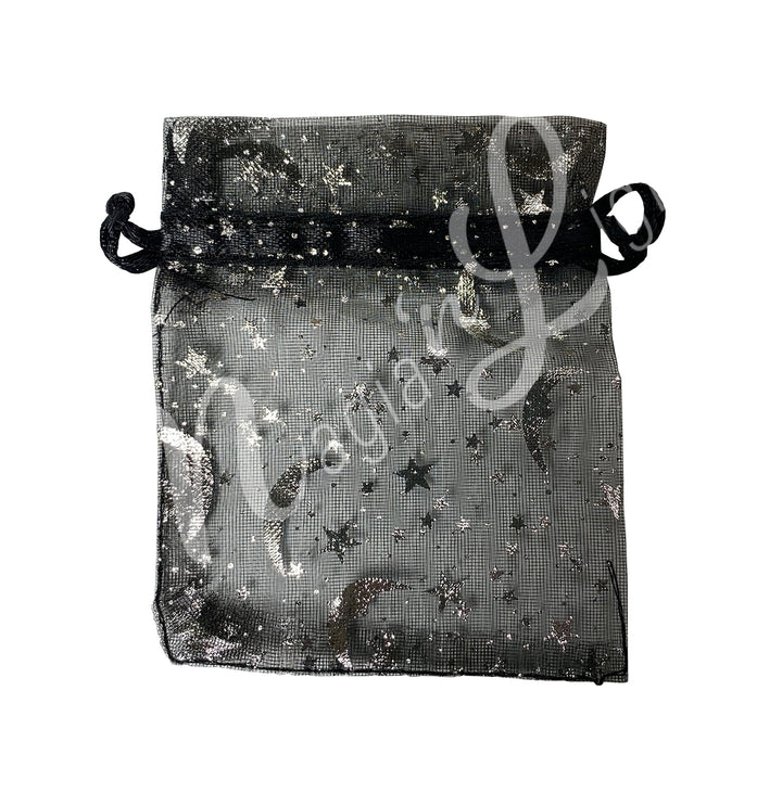 A black organza bag, featuring a printed celestial design.