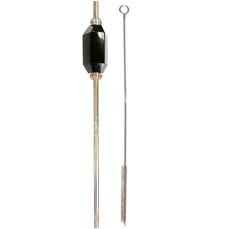 Stainless steel straw with a faceted black tourmaline stone accent, shown alongside a thin metal cleaning brush with a looped handle.