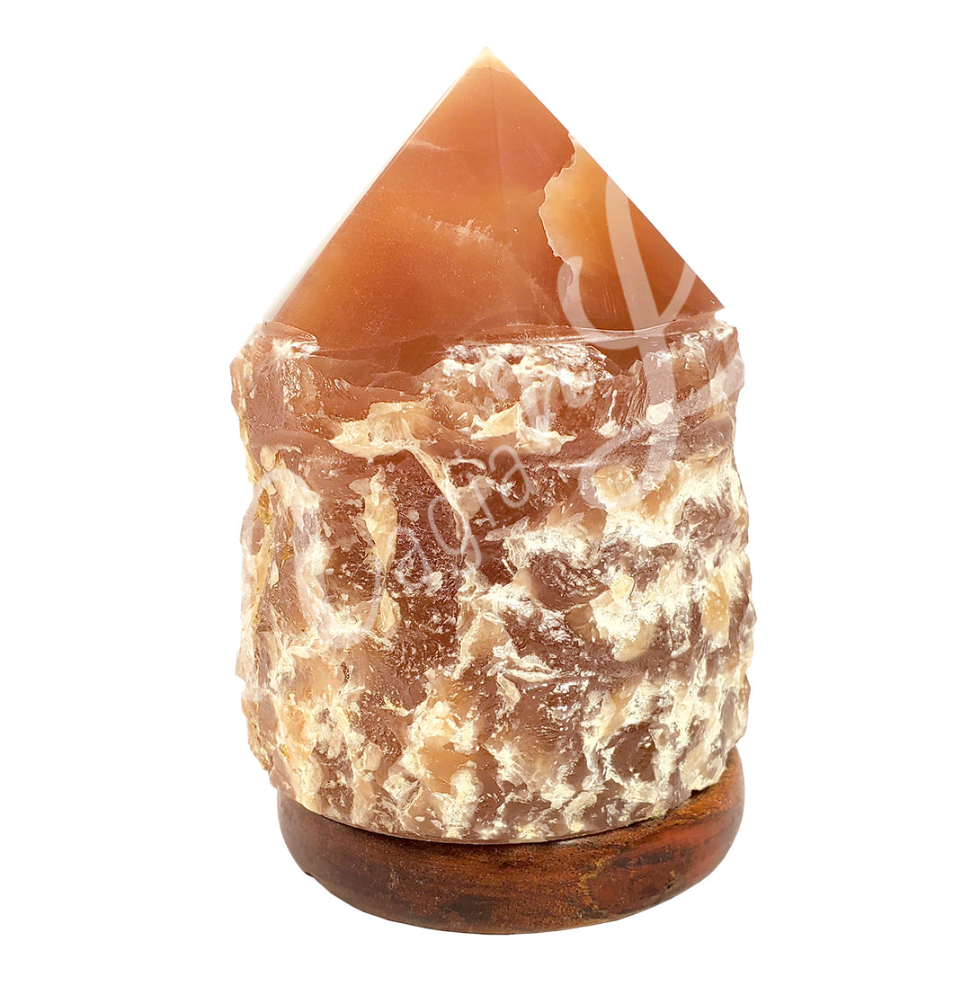 Top polished point calcite crystal lamp mounted on a dark wooden base