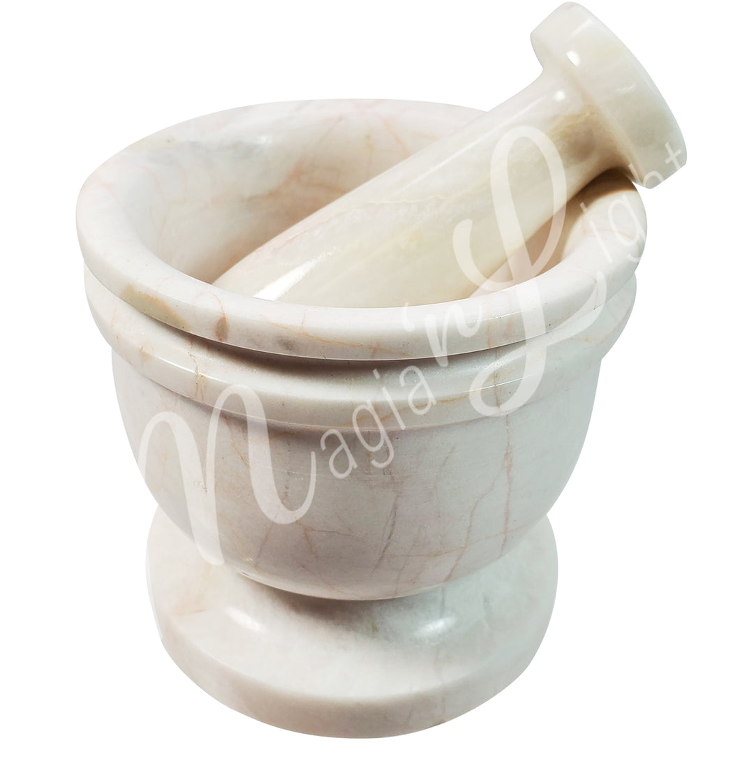 White marble with beige veining mortar and pestle set.