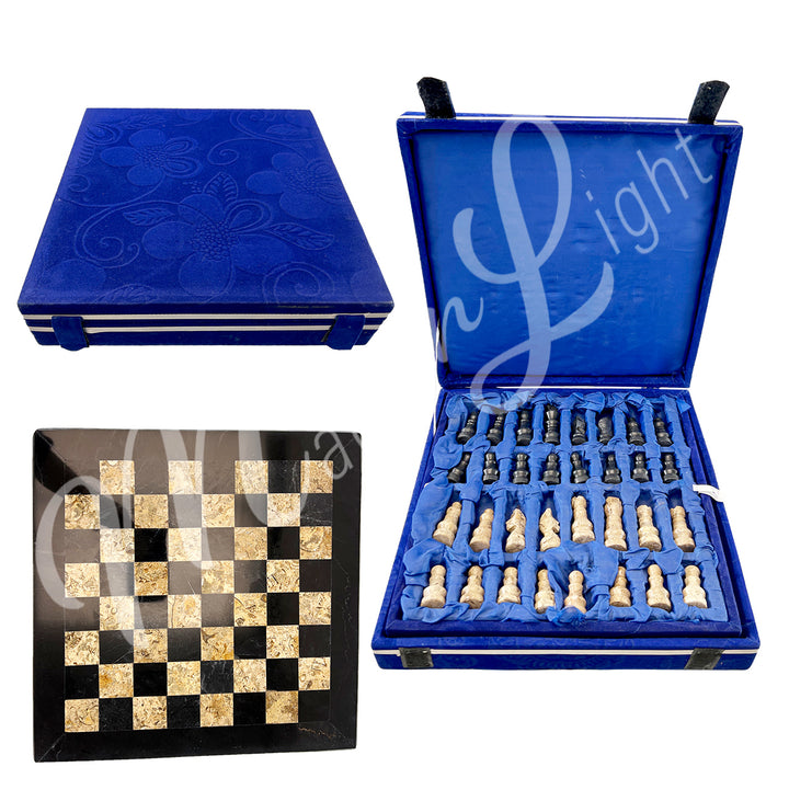 Coral chess set with carved pieces, in a blue velvet storage box and matching fossil stone chessboard.