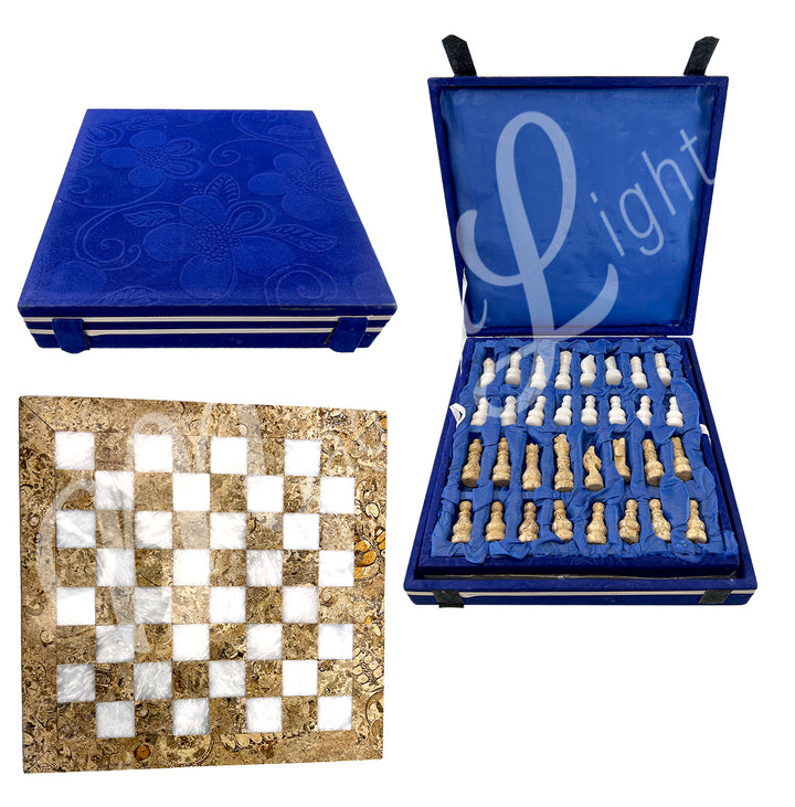 Coral chess set with carved pieces, in a blue velvet storage box and matching fossil stone chessboard.