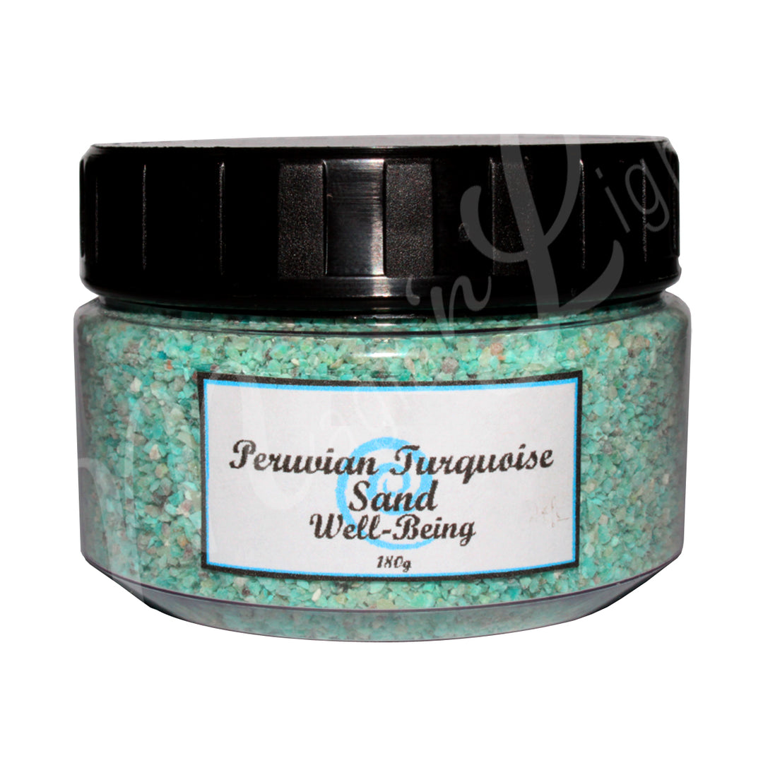 Clear plastic jar with a black lid containing turquoise stone sand. The label reads “Peruvian Turquoise Sand – Well-Being, 180 g.”