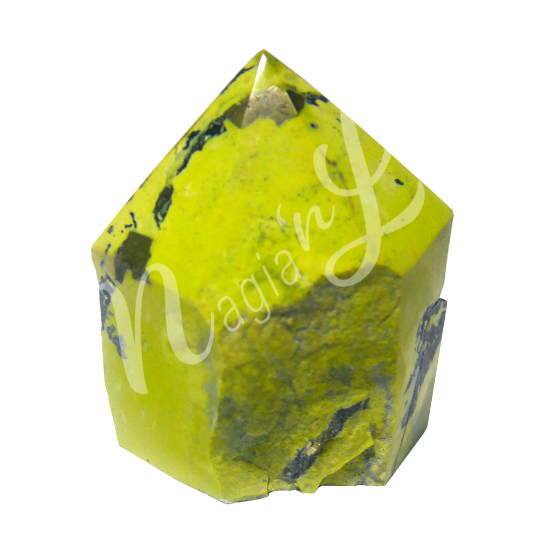 A piece of green-yellow stone with black specks. The top is cut to form a point.