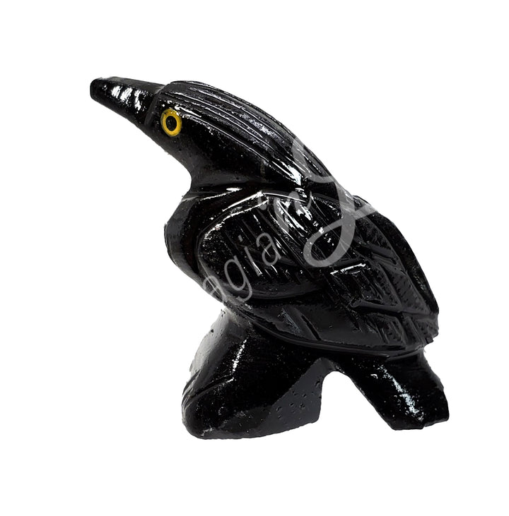 A carving of a raven made of black onyx.