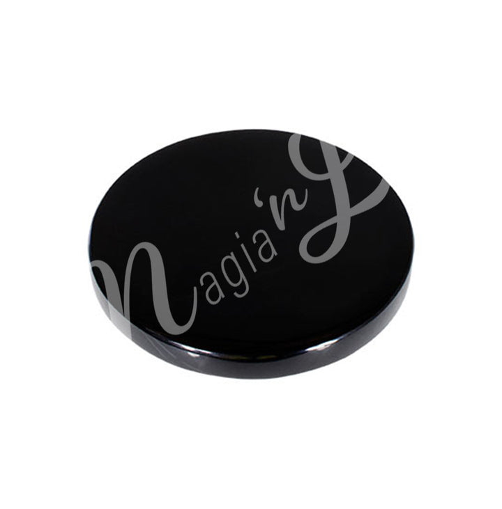 a round Scrying mirror made from obsidian.