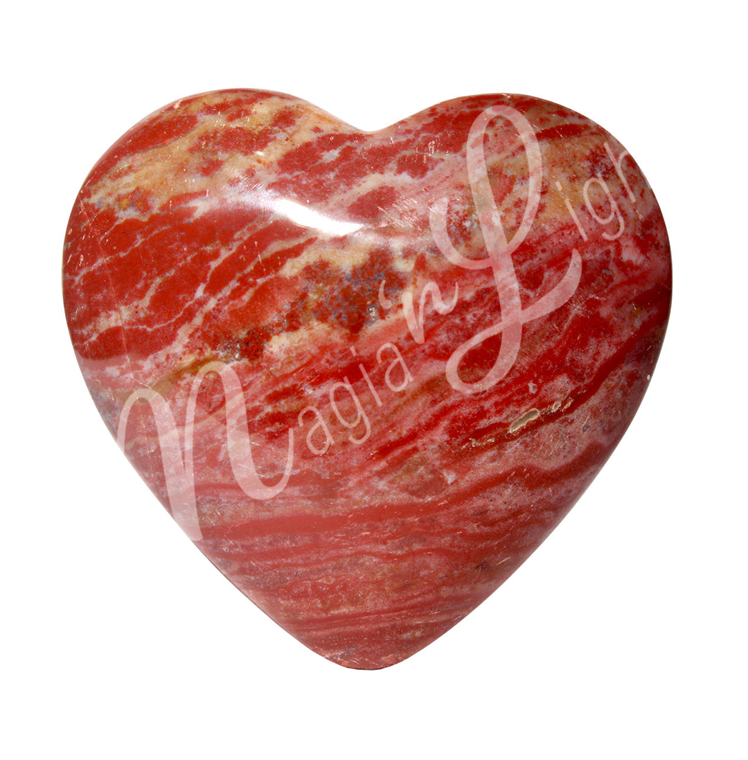 Heart-shaped petrified wood crystal.