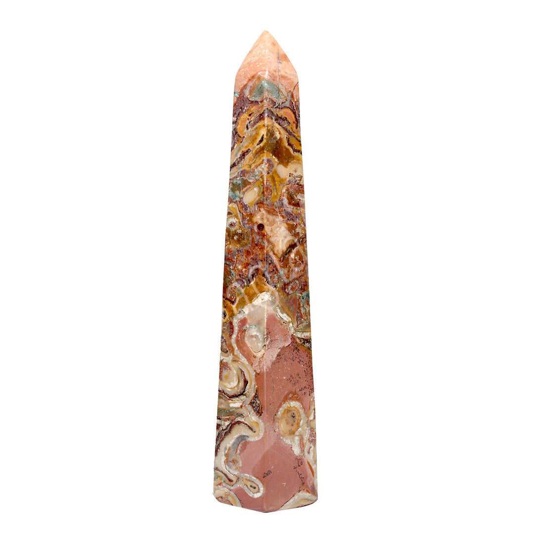 A pink standing point featuring layered bands of warm, earthy tones.