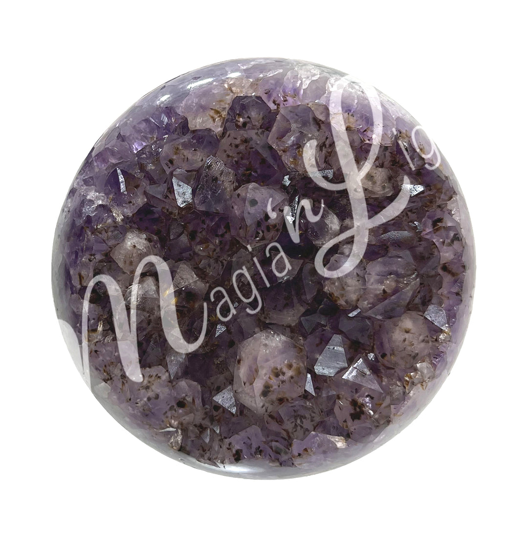 A sphere made of Amethyst with a geode center.