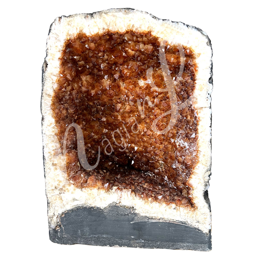 Front view of a long citrine cathedral. The center is yellow with glitter while the sides go from white to black on the exterior.