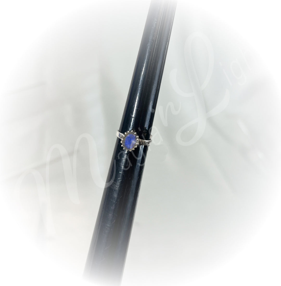 A sterling silver ring with labradorite stone.