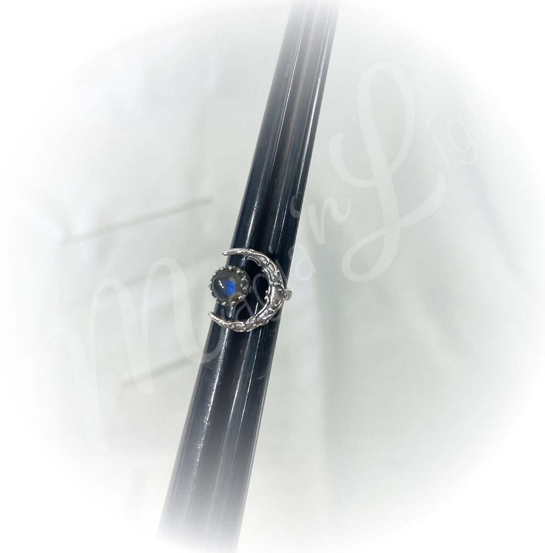 A sterling silver ring with labradorite stone.