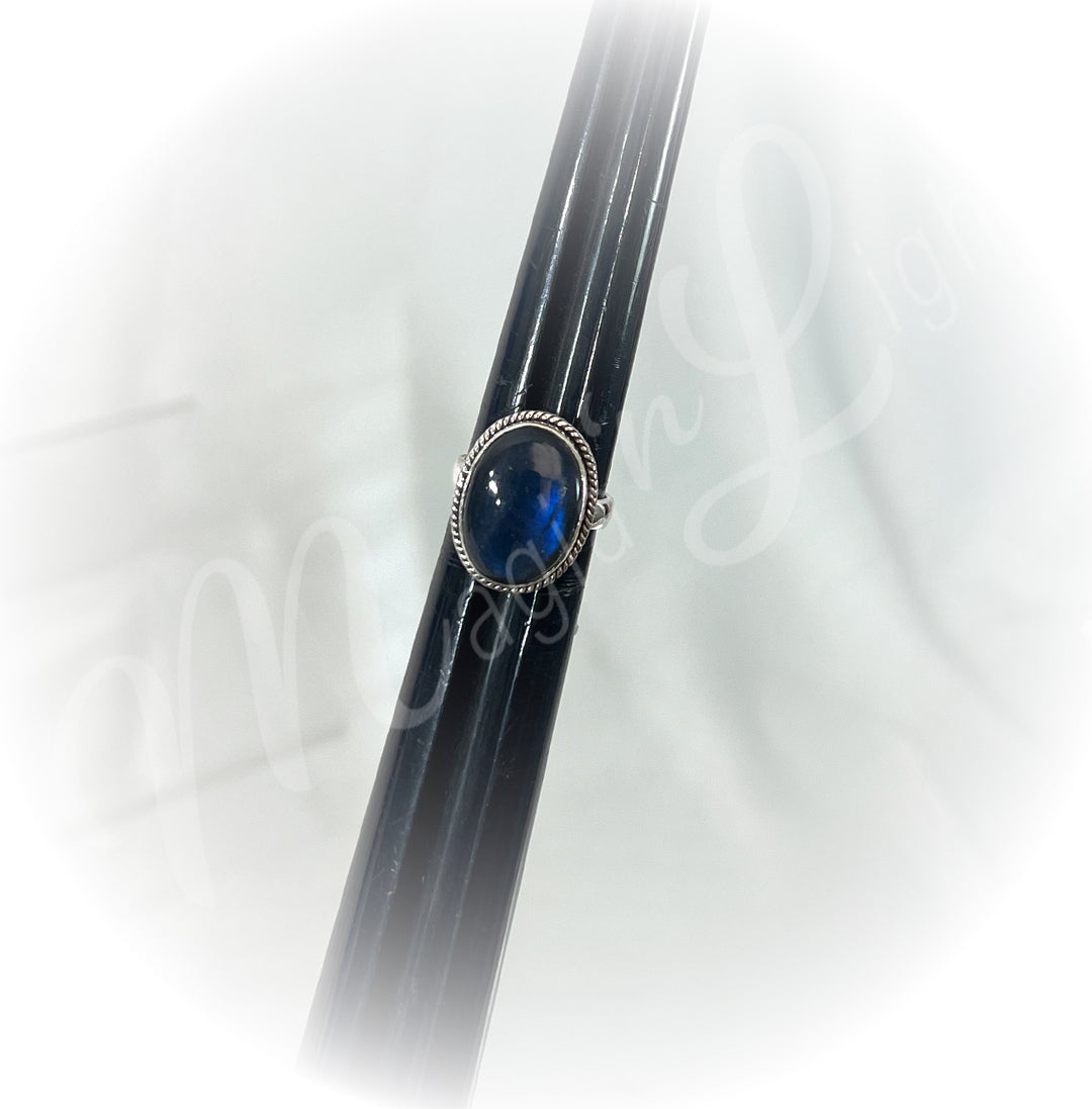 A sterling silver ring with labradorite stone.