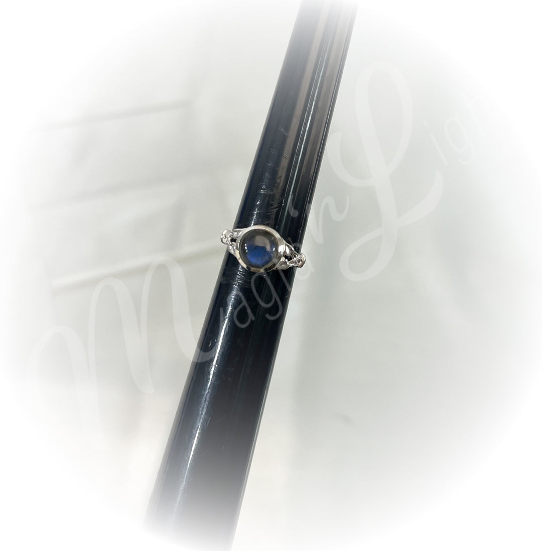 A sterling silver ring with labradorite stone.