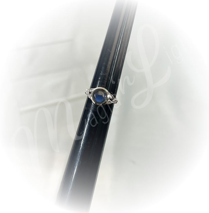 A sterling silver ring with labradorite stone.