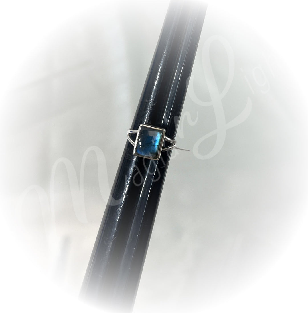 A sterling silver ring with labradorite stone.