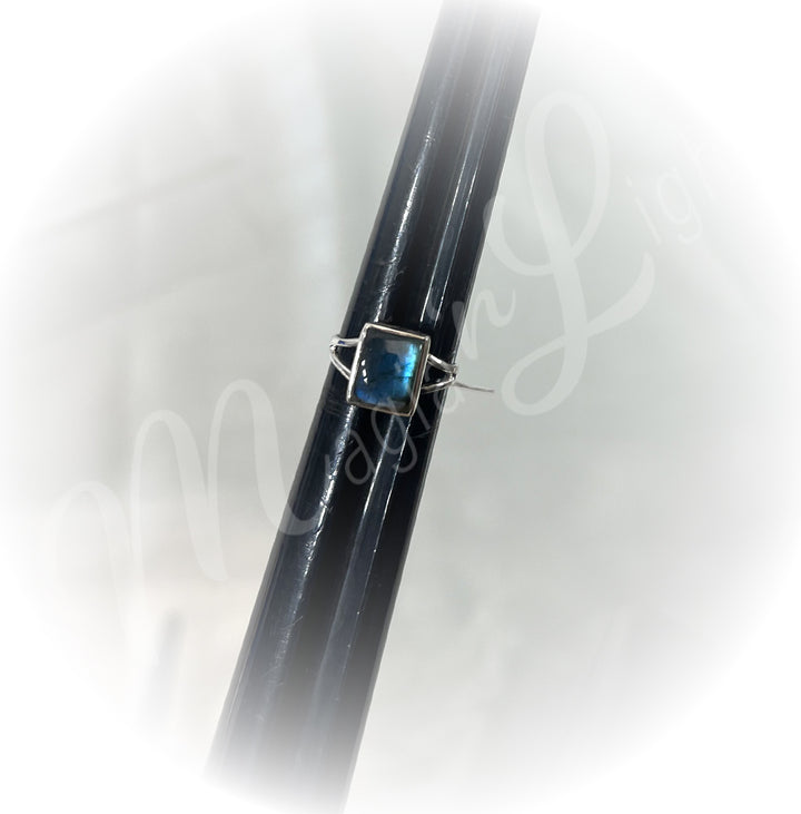 A sterling silver ring with labradorite stone.