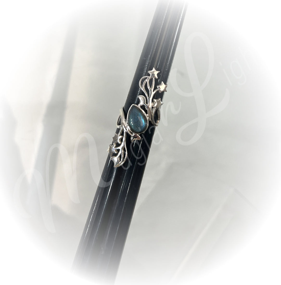 A sterling silver ring with labradorite stone.