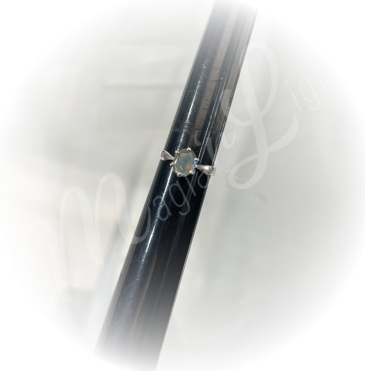 A sterling silver ring with labradorite stone.