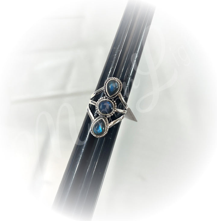 A sterling silver ring with labradorite stone.