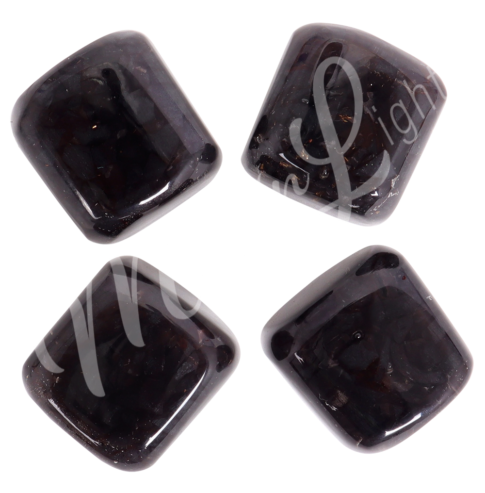 Four tumbled stones of Lodestone arranged in a circular pattern.