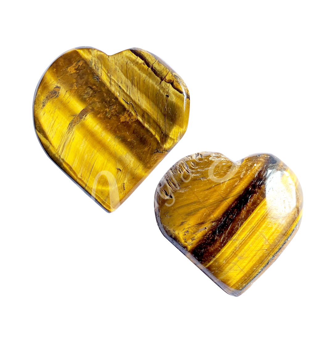Two polished, clear heart-shaped stones with a smooth, glossy surface. Each stone features layered bands of yellow and brown.