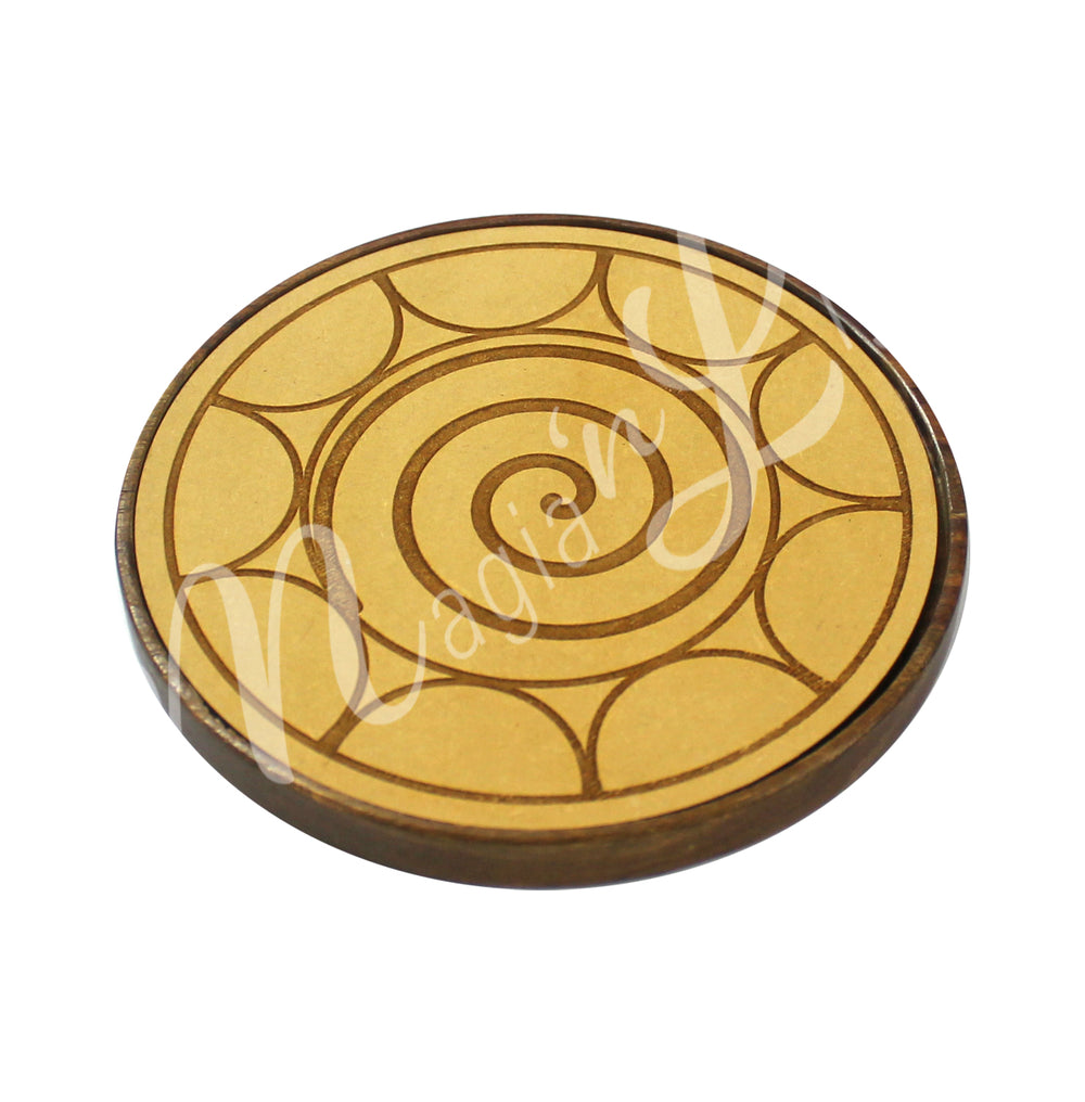 An empty wooden crystal grid board. The design features:
A central spiral pattern radiating outward. Circular arcs forming a flower-like pattern around the edges. A smooth wooden border.