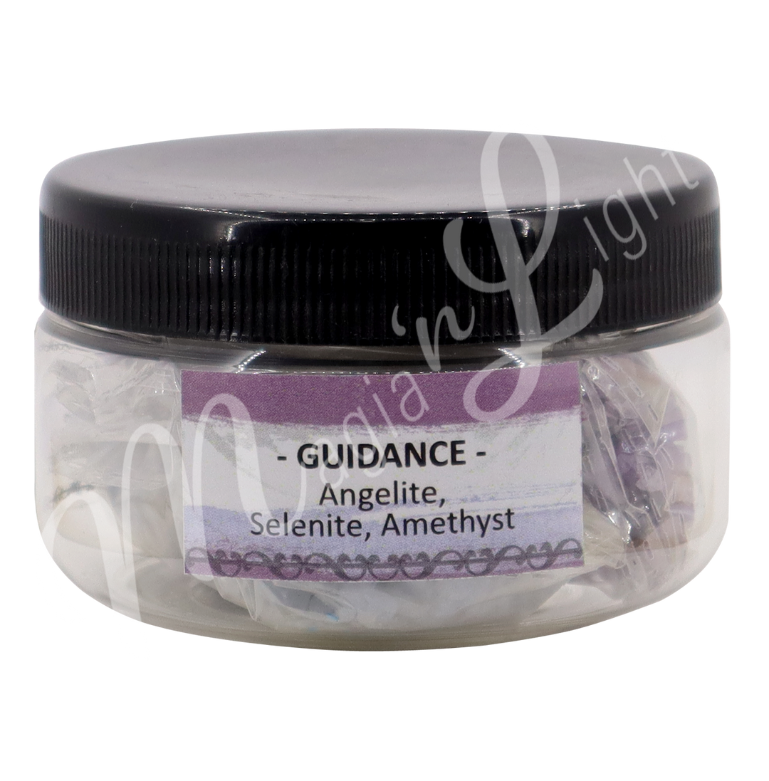 A transparent jar with black lid. The label reads "Guidance" "Angelite, Selenite & Amethyst".