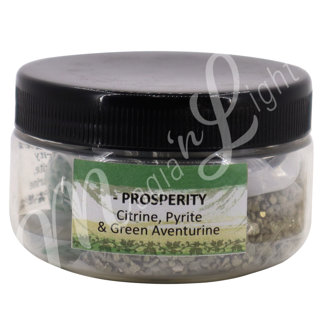 A transparent jar with black lid. The label reads "Prosperity" "Citrine, Pyrite & Green Aventurine".