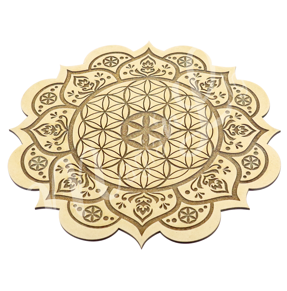 A flower of life acacia wood cystal grid engraved seen with an angle. 