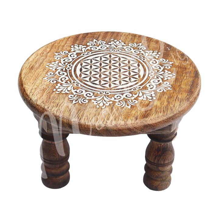 Mango Wood Altar Table Engraved with Flower of Life. Seen at an angle.