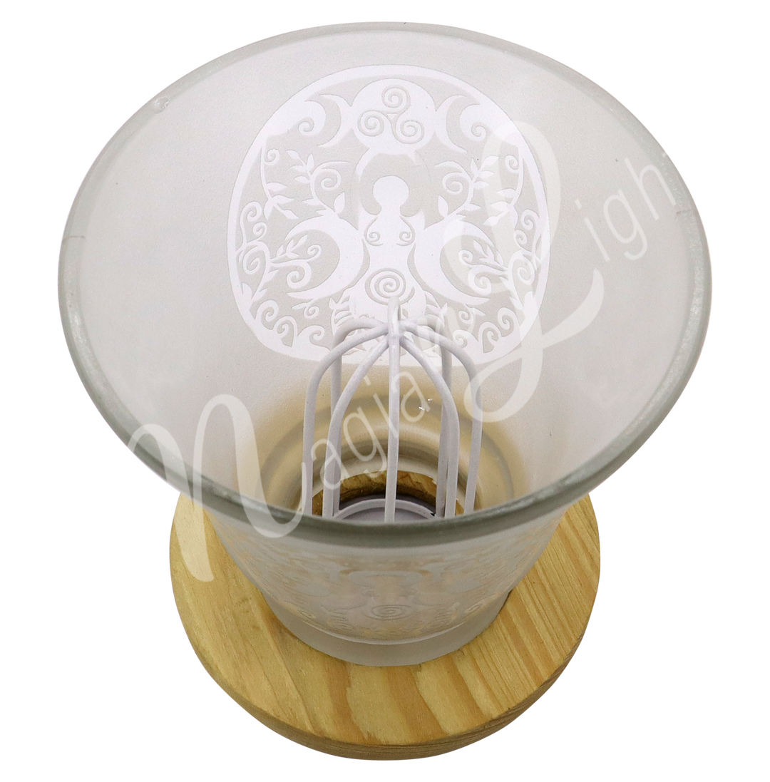 Empty decorative frosted glass cup lamp with etched Goddess design, wooden base, metal piece in the middle.