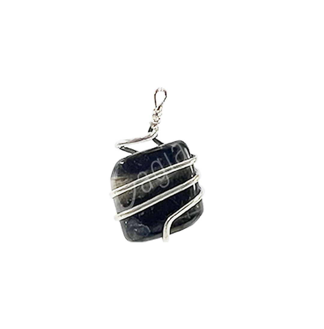 A silver-plated wire wrapped around a tumbled Blue Tiger Eye stone with a small loop for a necklace chain.