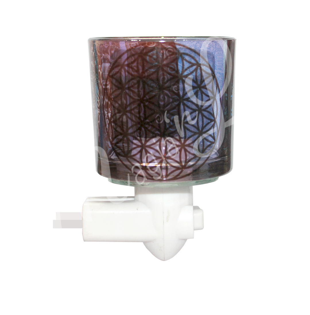 A glass night light featuring an engraved flower of life symbol, attached to a small light fixture.