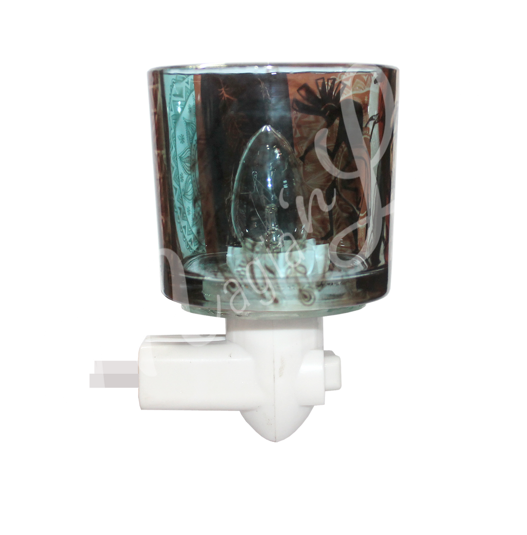 A glass night light featuring an engraved dreamcatcher symbol, attached to a small light fixture.